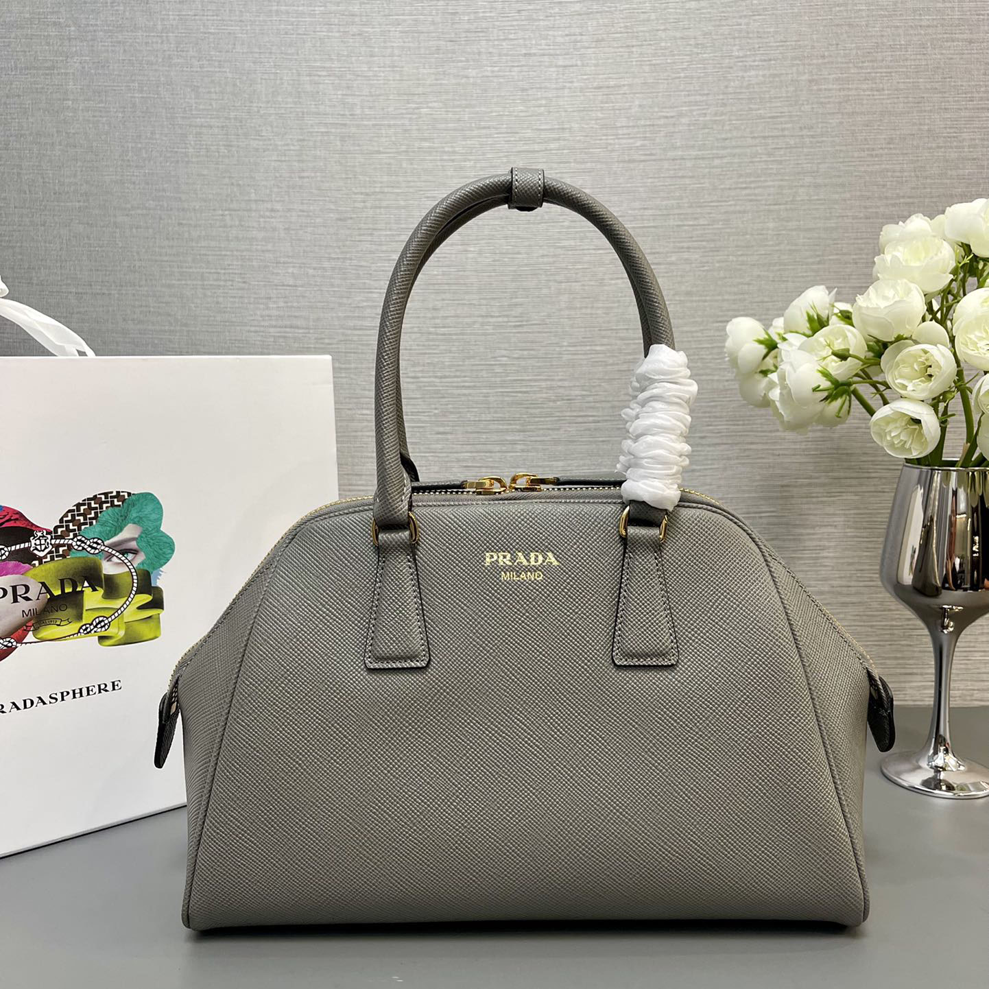 Pra*a top handle bags